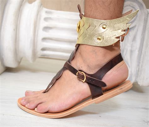 pic of god hermes putting his sandal on|hermes sandals binder.